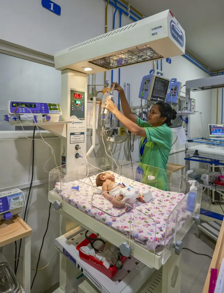 Medical students observing a procedure