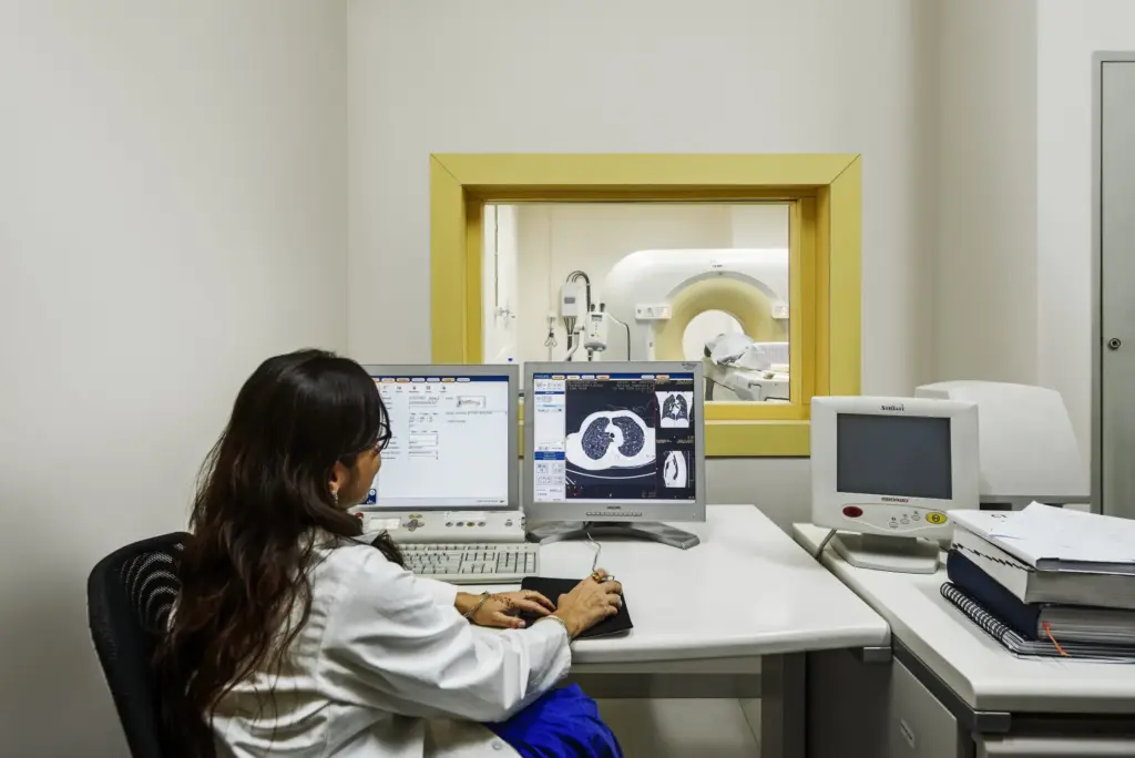 Medical students observing a procedure
