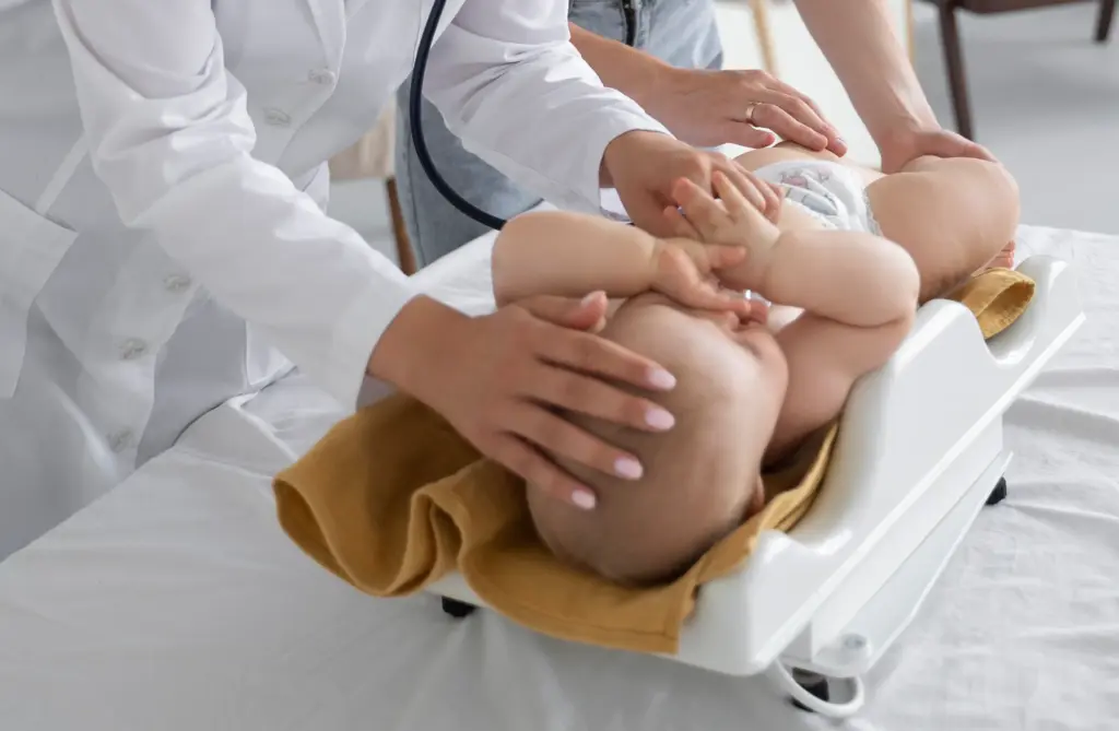 Medical students observing a procedure